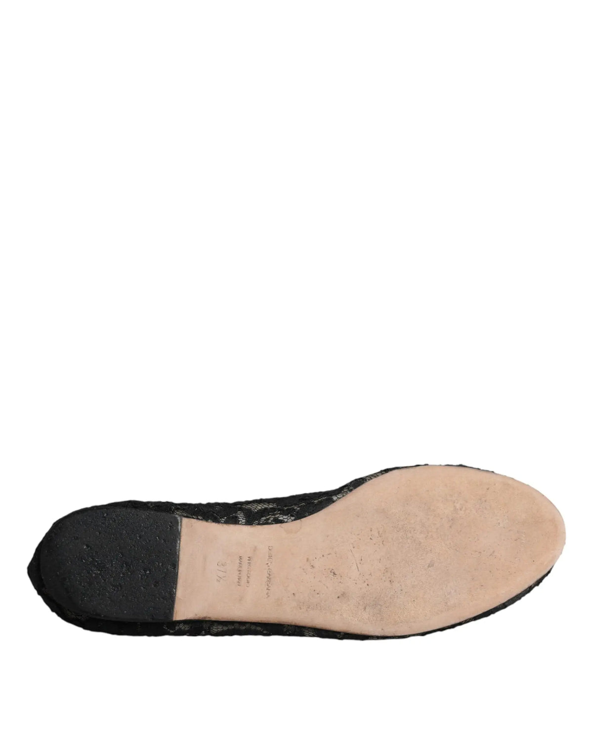 Dolce & gabbana taormina chaussures plates slip on noires en dentelle avec semelle texturée et semelle intérieure marquée