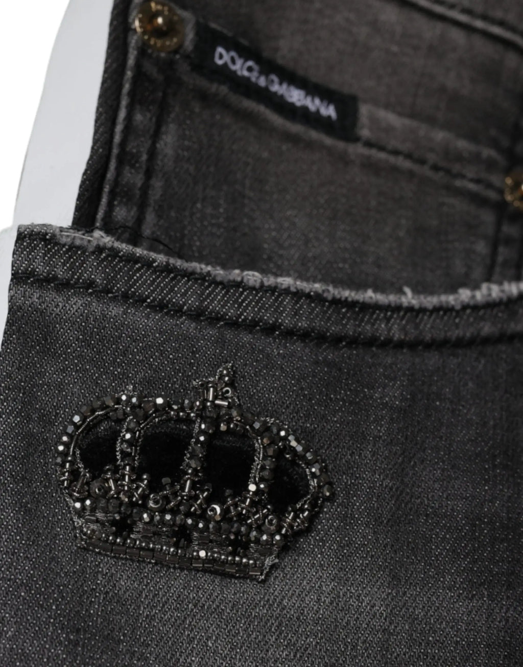 Jean slim en coton noir dolce & gabbana avec emblème de couronne perlée sur la poche avant