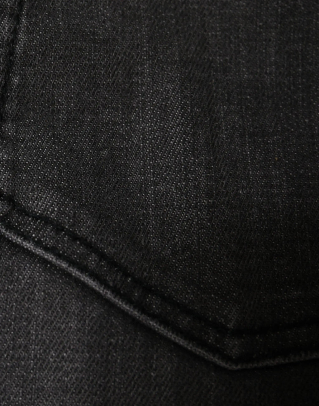 Jeans skinny pour homme dolce & gabbana en denim coton noir avec texture subtile et coutures visibles au niveau de la couture