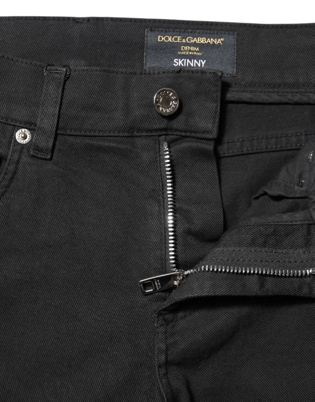 Jean skinny noir dolce & gabbana en denim avec doublure blanche déchirée et fermeture éclair métallique