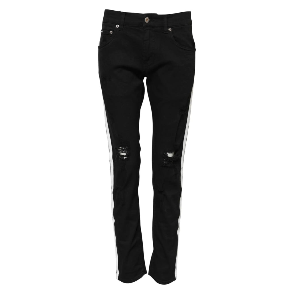 Dolce & Gabbana jean skinny en denim noir avec rayures blanches verticales et déchirures aux genoux