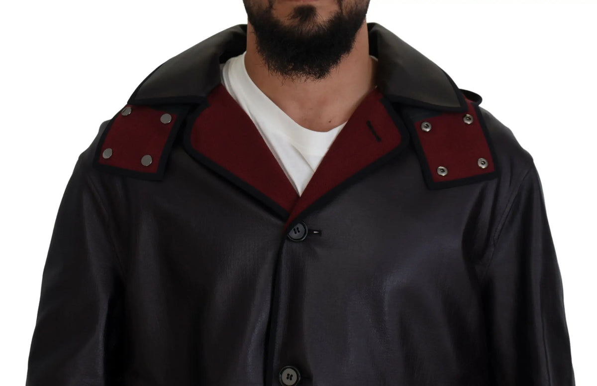 Dolce & gabbana black leather coat with red collar and shoulder patches accented by silver buttons