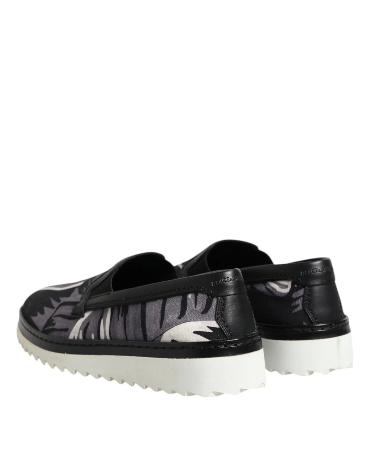 Dolce & gabbana baskets noires homme slip-on avec motif feuilles gris blanc et semelle épaisse en caoutchouc blanc