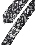 Cravate noire en soie dolce & gabbana ajustable avec motif blanc d’instruments de musique et logo en carré