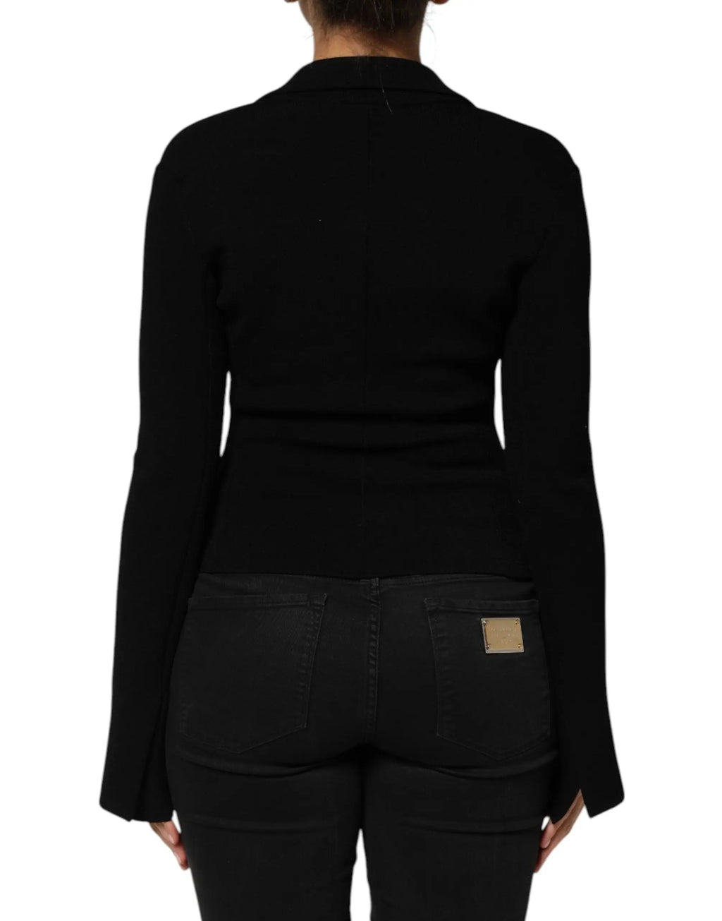Black long-sleeved knit top with collar and flared cuffs, styled under dolce & gabbana black viscose single breasted blazer jacket