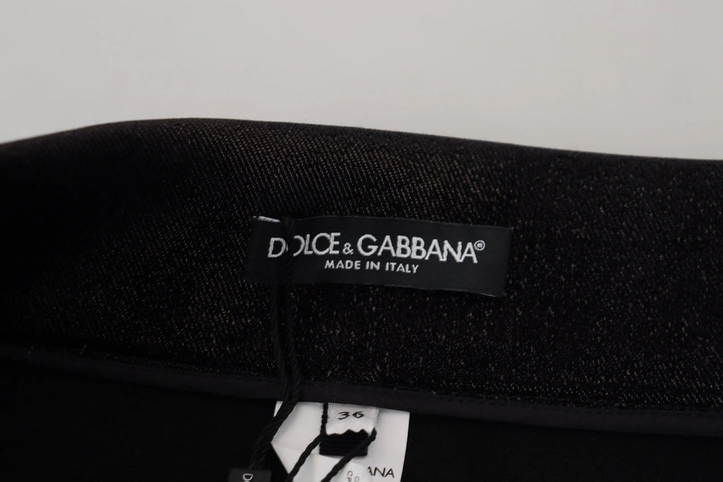Étiquette noire dolce & gabbana indiquant made in italy pour jean skinny en coton noir délavé