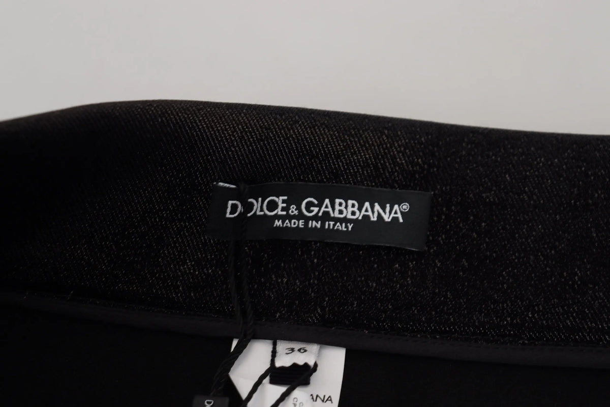 Étiquette noire dolce & gabbana indiquant made in italy pour jean skinny en coton noir délavé