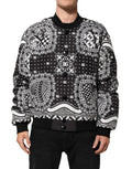 Dolce & Gabbana bomber jacket noir et blanc à motifs bandana avec designs floraux et logos dc répétés