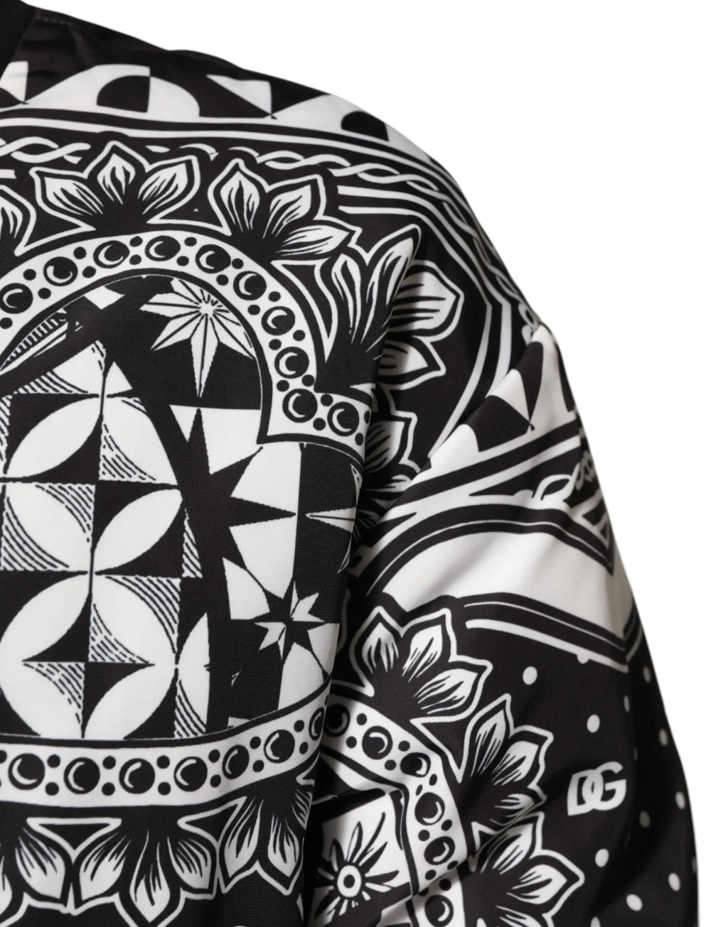 Manche de veste bomber homme dolce gabbana noir et blanc avec motifs floraux géométriques et logo dg en relief