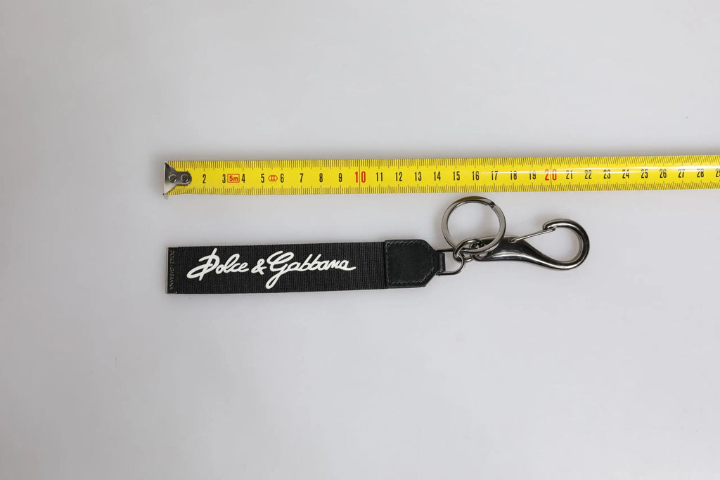 Dolce & gabbana porte-clés noir avec logo blanc en script et fermoir métallique argenté en polyester pour homme