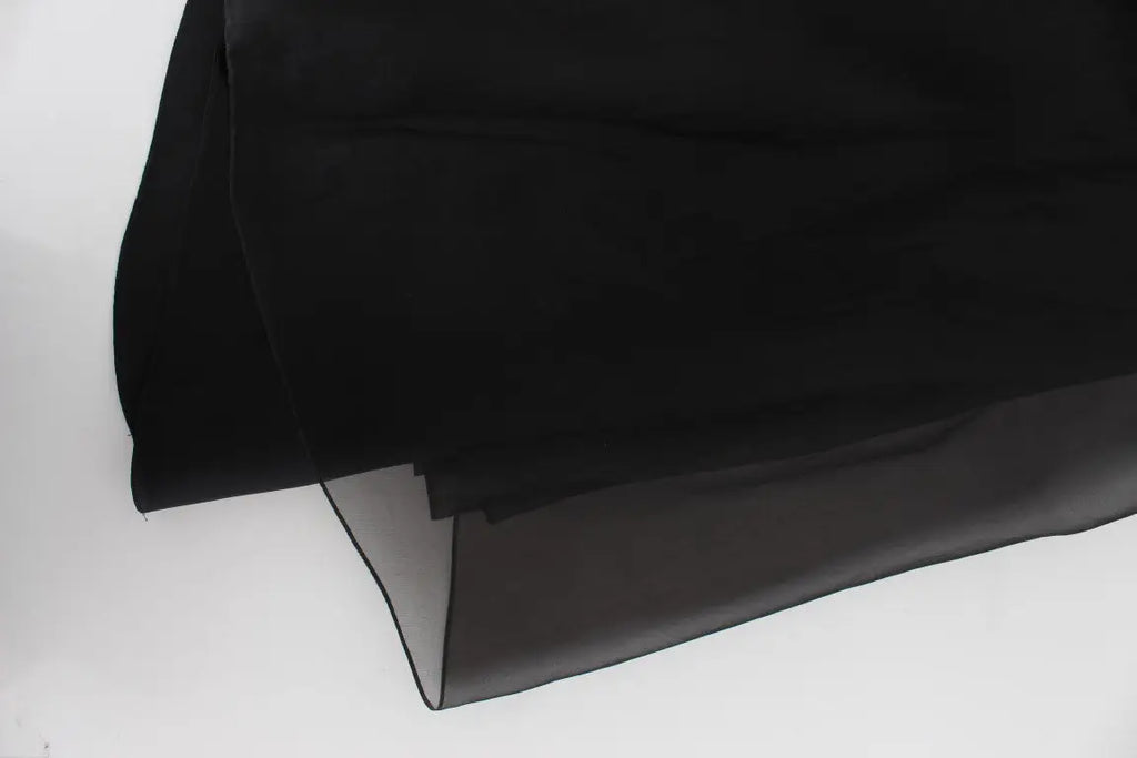 Tissu noir transparent en soie pour robe fourreau florale noire et blanche dolce & gabbana avec texture fluide