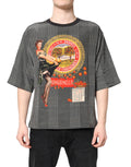T-shirt dolce & gabbana à manches courtes noir et blanc en coton avec motif vintage femme tenant des oranges sanginella et calendrier italien novembre