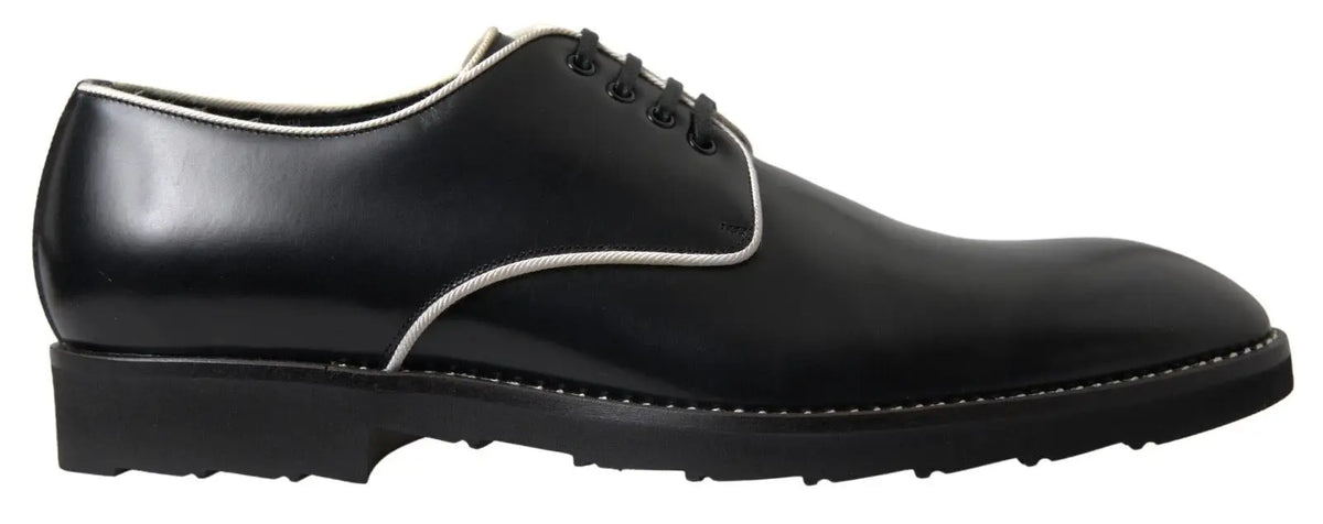 Dolce & gabbana chaussures derby en cuir noir avec coutures blanches contrastantes et lacets blancs pour tenue formelle
