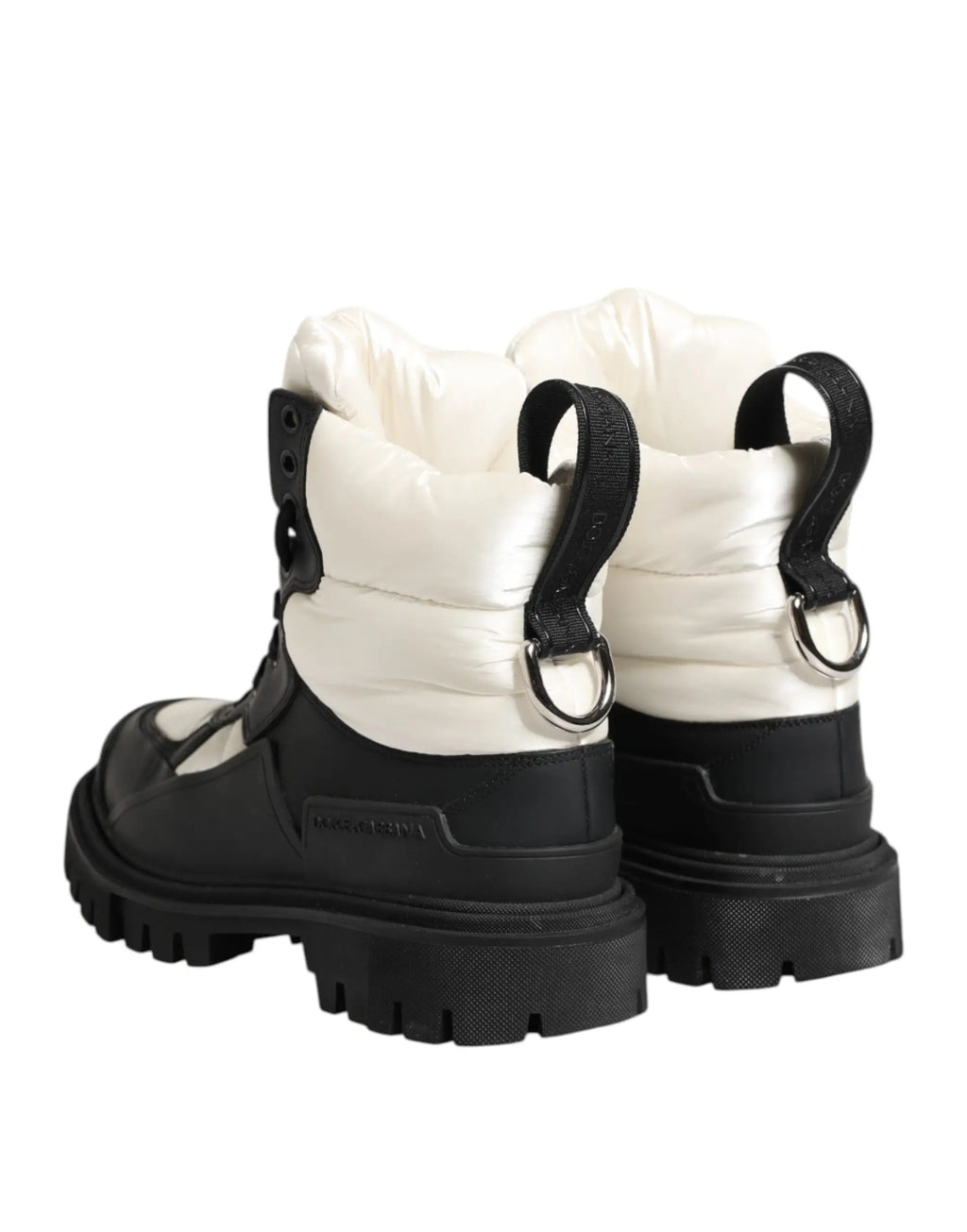 Dolce & gabbana black white padded lace up short boots showing back view with white quilted design black rubber soles and straps