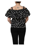 Dolce & gabbana top noir et blanc à pois avec épaules dénudées et manches volantées en tissu léger