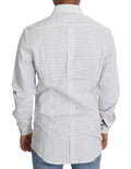 Chemise blanche dolce gabbana à pois noirs subtils avec col classique et poignets boutonnés en coton élégant