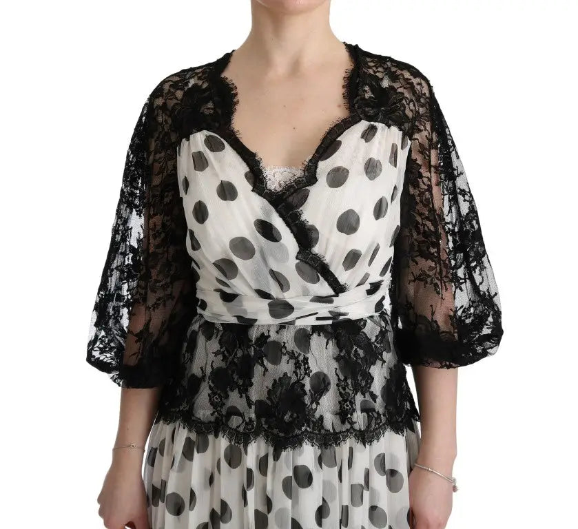 Robe dolce & gabbana noire et blanche à pois avec manches en dentelle transparente et bordure en dentelle assortie