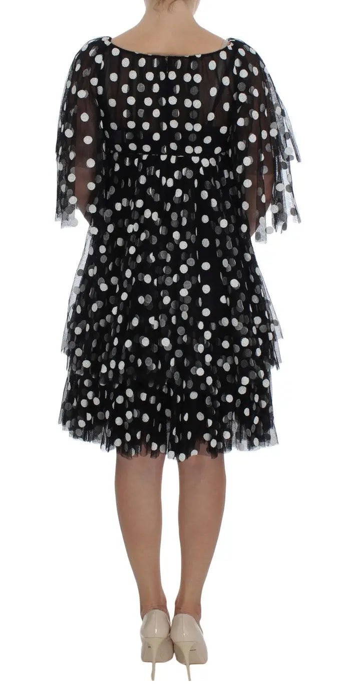 Robe à pois noire blanc dolce & gabbana à volants avec manches transparentes fluides et taille cintrée