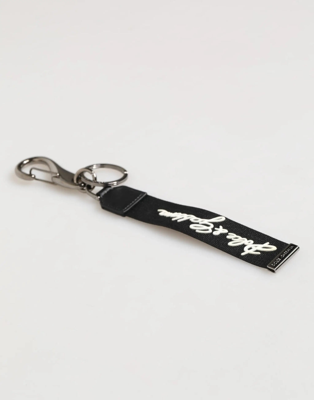 Keychain dolce & gabbana noir en polyester avec logo dg blanc en cursive et attache métal argentée pour homme