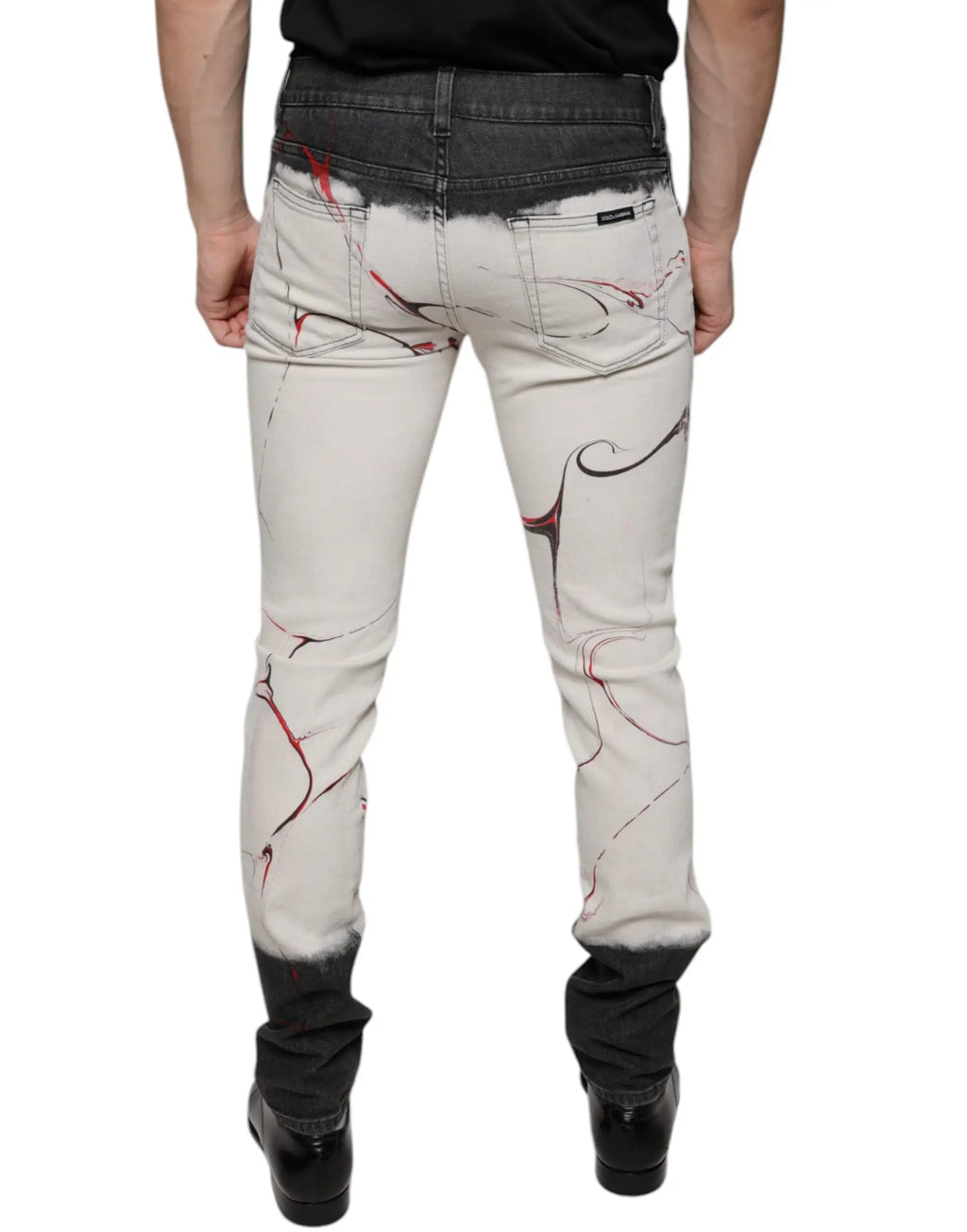 Dolce & gabbana black white printed skinny men denim jeans en jean blanc avec éclaboussures noir et rouge et ceinture indigo