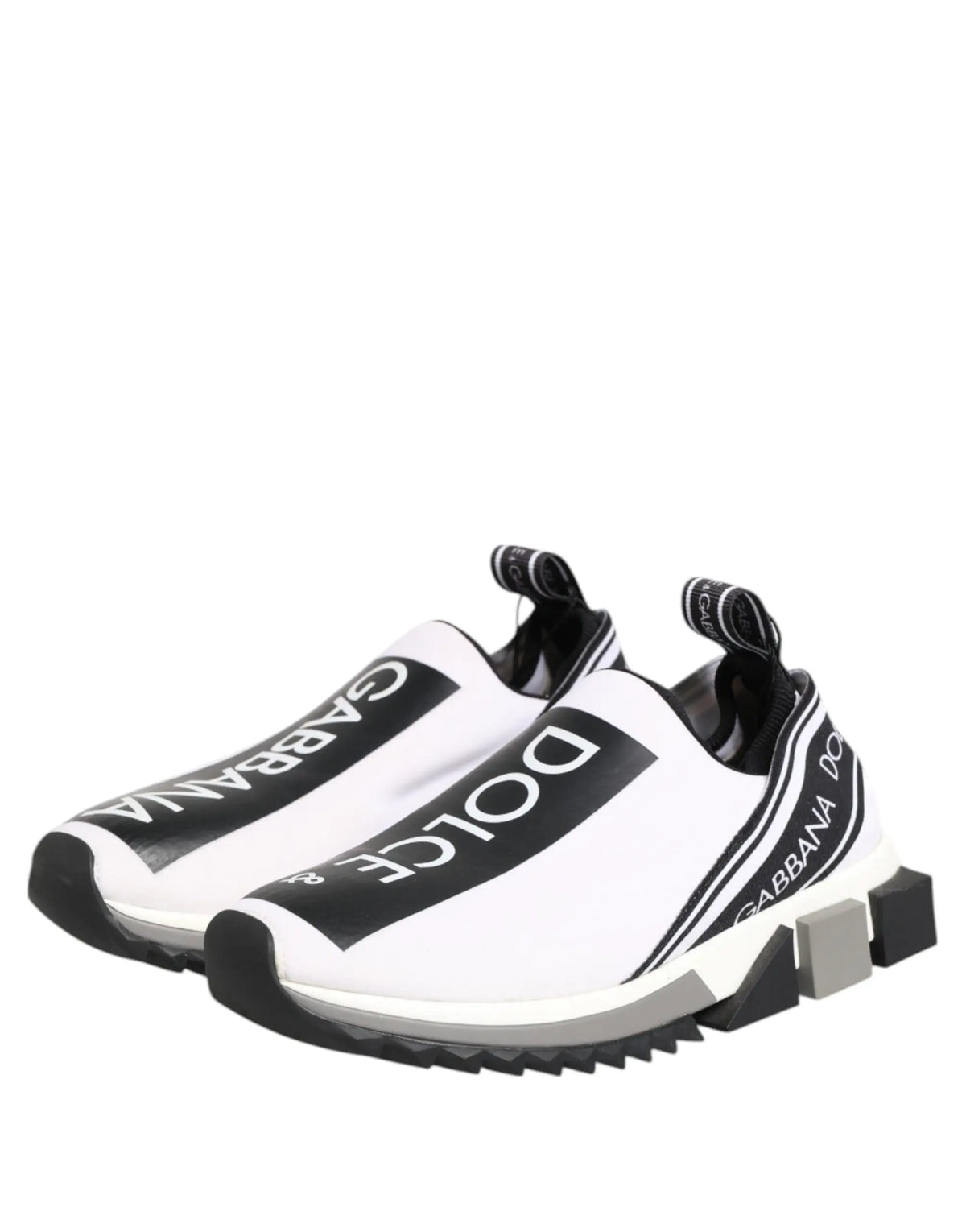 Dolce & gabbana slip-on sneakers blancs et noirs avec bandes logo audacieuses et semelle géométrique épaisse