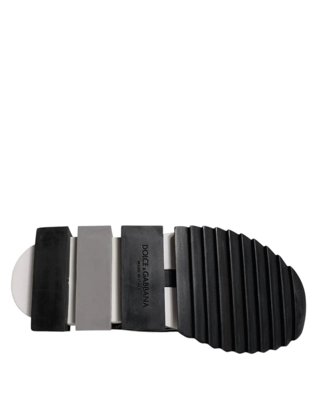 Semelle noire en caoutchouc avec intermédiaire métallique argent et logo dolce & gabbana sur sneakers slip on noire et blanche