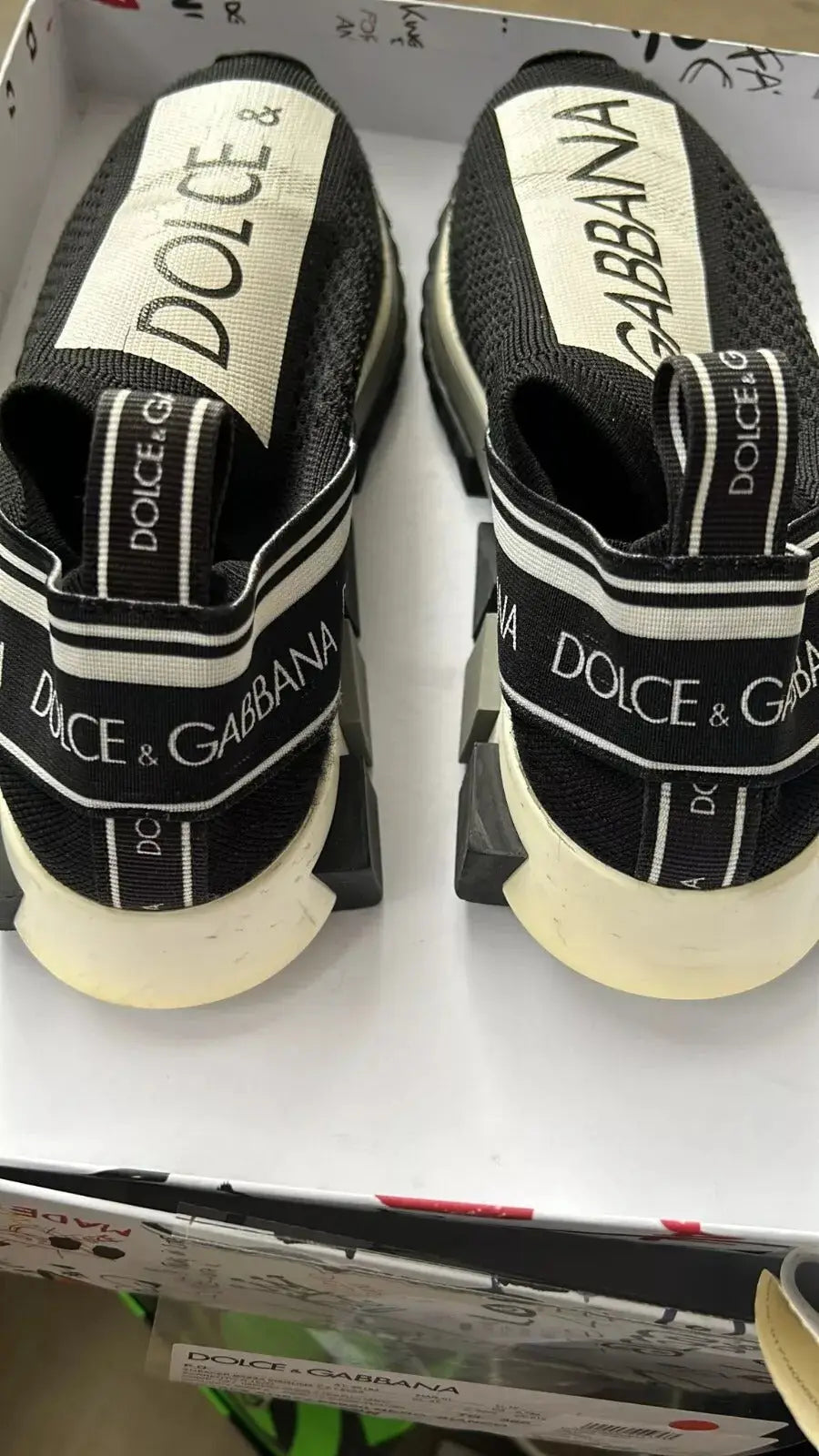 Baskets dolce & gabbana noir avec bandes blanches et semelle épaisse modèle slip on sorrento