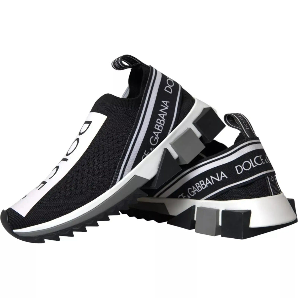 Baskets dolce & gabbana noire et blanche slip on avec empeigne en mesh, bandes de branding audacieuses et semelles géométriques épaisses