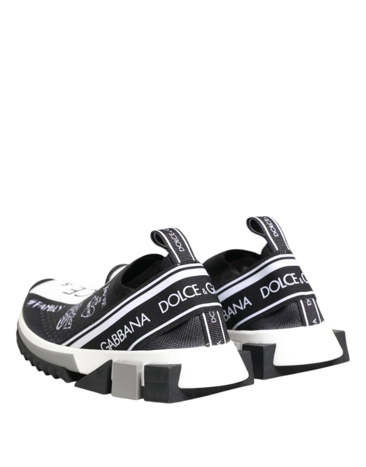 Baskets basses dolce & gabbana noir et blanc avec rayures branding audacieuses semelle épaisse en caoutchouc et design slip-on élastique