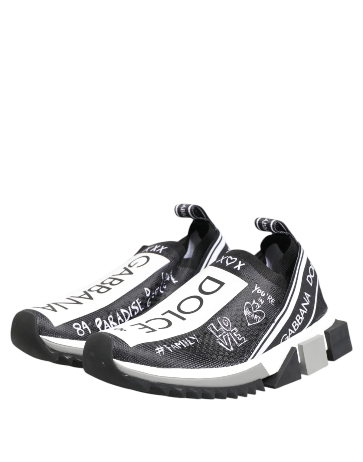 Dolce & gabbana baskets slip-on noirs et blancs avec lettrage graphique bold et semelle épaisse