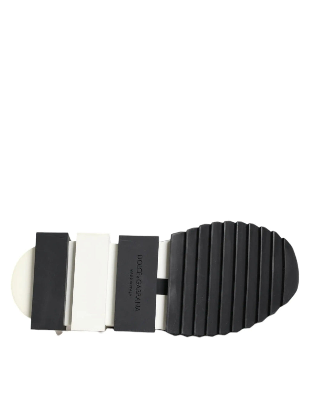 Semelle en caoutchouc noir et blanc texturée avec logo dolce gabbana sur une étiquette rectangulaire noire pour sneakers basses sorrento