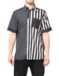 Dolce & gabbana chemise noire et blanche à rayures diagonales et verticales avec pois sur poche et poignets