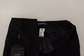 Pantalon tapered noir dolce & gabbana en laine avec fines rayures blanches et tissu lisse et taillé avec soin