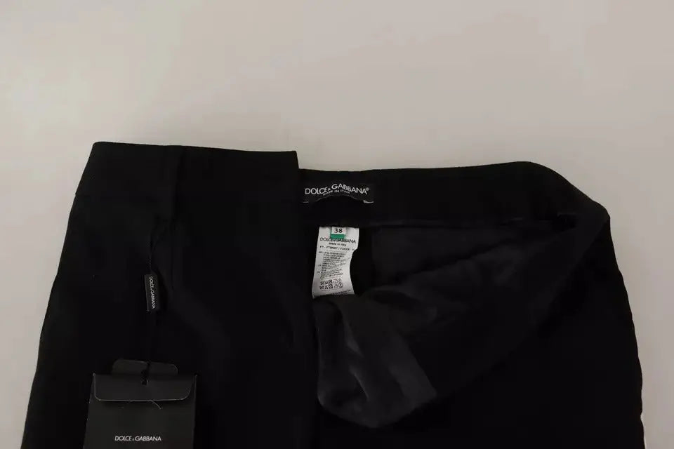 Pantalon tapered noir dolce & gabbana en laine avec fines rayures blanches et tissu lisse et taillé avec soin