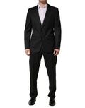 Dolce & gabbana costume noir en laine à deux boutons avec coupe moderne et pantalon assorti formel