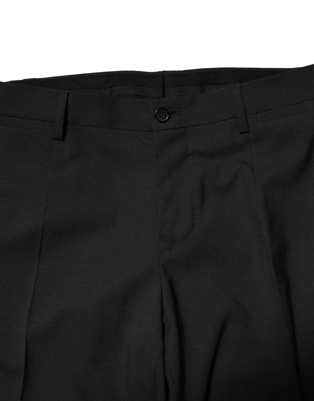Pantalon plissé noir dolce gabbana en laine avec coupe ajustée et fermeture simple boutonnée à la taille