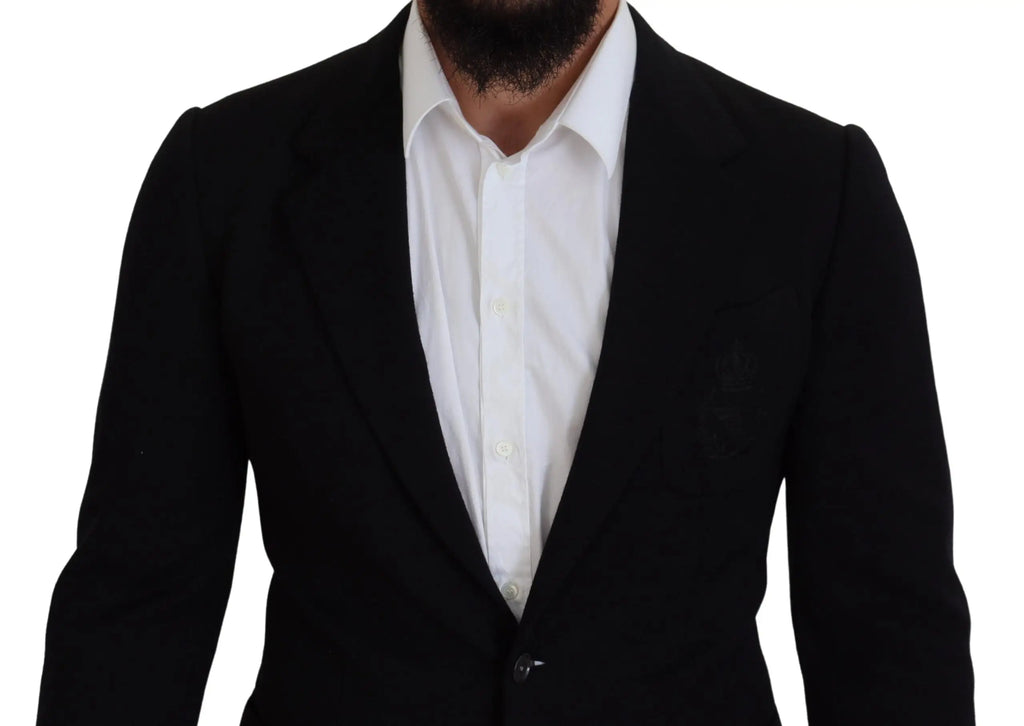 Dolce & gabbana black wool crown slim fit jacket blazer avec revers crantés porté sur une chemise blanche boutonnée
