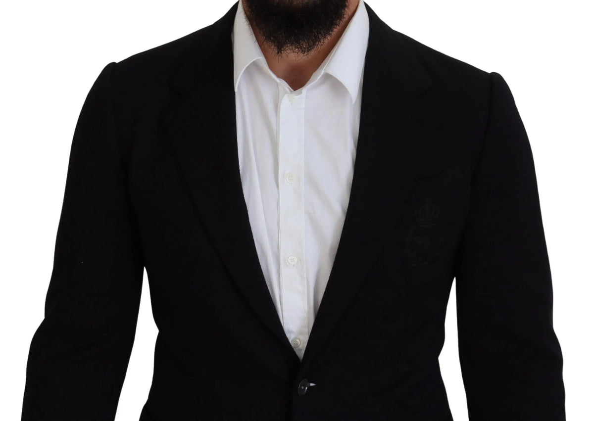 Dolce & gabbana black wool crown slim fit jacket blazer avec revers crantés porté sur une chemise blanche boutonnée
