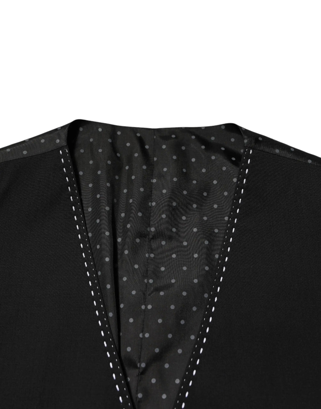 Gilet noir en laine dolce gabbana pour homme avec doublure à pois discrète et surpiqûres blanches contrastantes