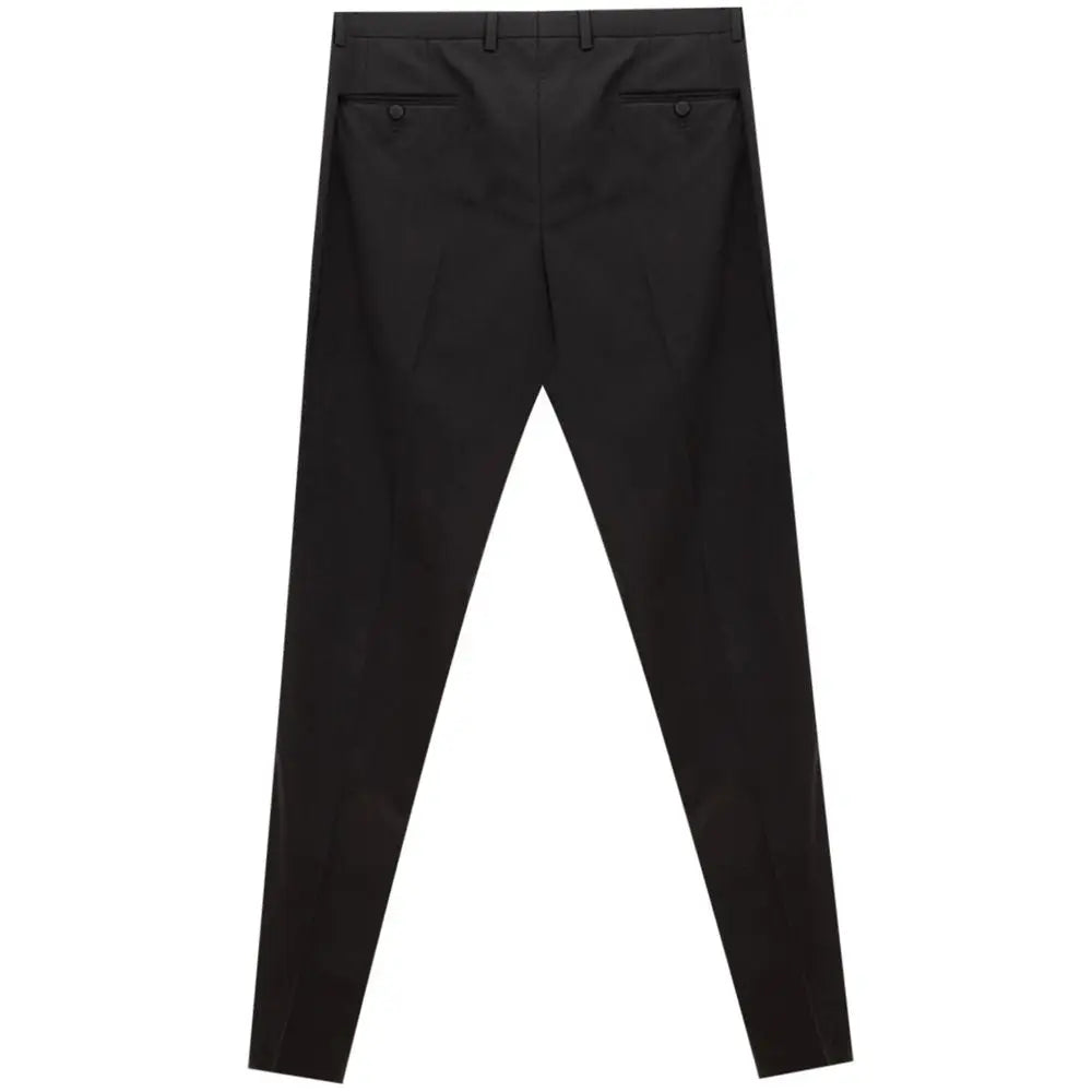 Pantalon de costume dolce & gabbana noir en laine coupe slim avec plis subtils à l’arrière vue de dos
