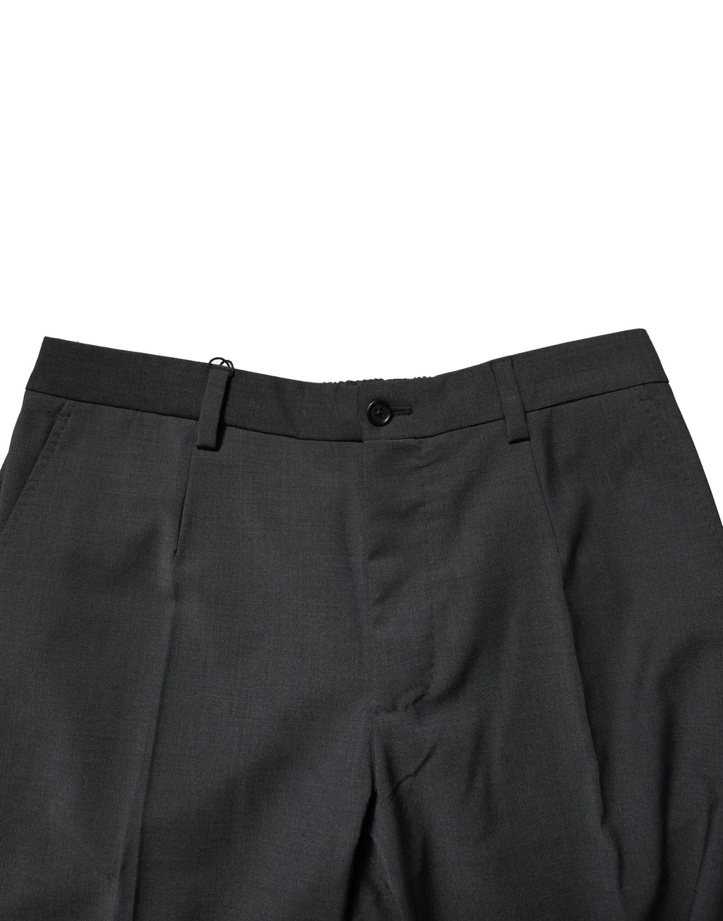 Pantalon noir en laine dolce & gabbana ajusté avec un design structuré et plis subtils pour un style formel