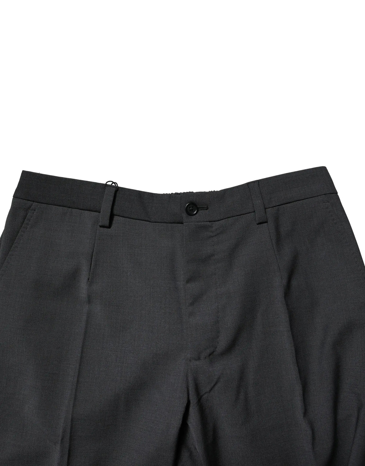 Pantalon noir en laine dolce & gabbana ajusté avec un design structuré et plis subtils pour un style formel