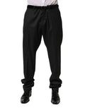 Pantalon formel pour homme dolce & gabbana en laine noire avec plis, coupe ajustée et revers roulés