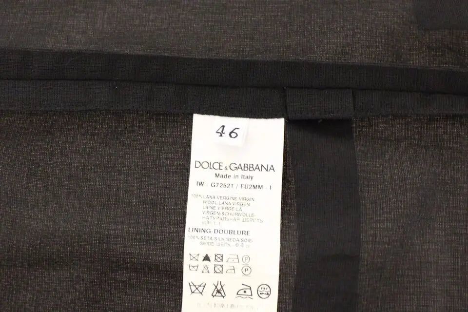 Étiquette de soin dolce & gabbana blanche cousue sur tissu texturé gris foncé du gilet veste formelle en laine noire