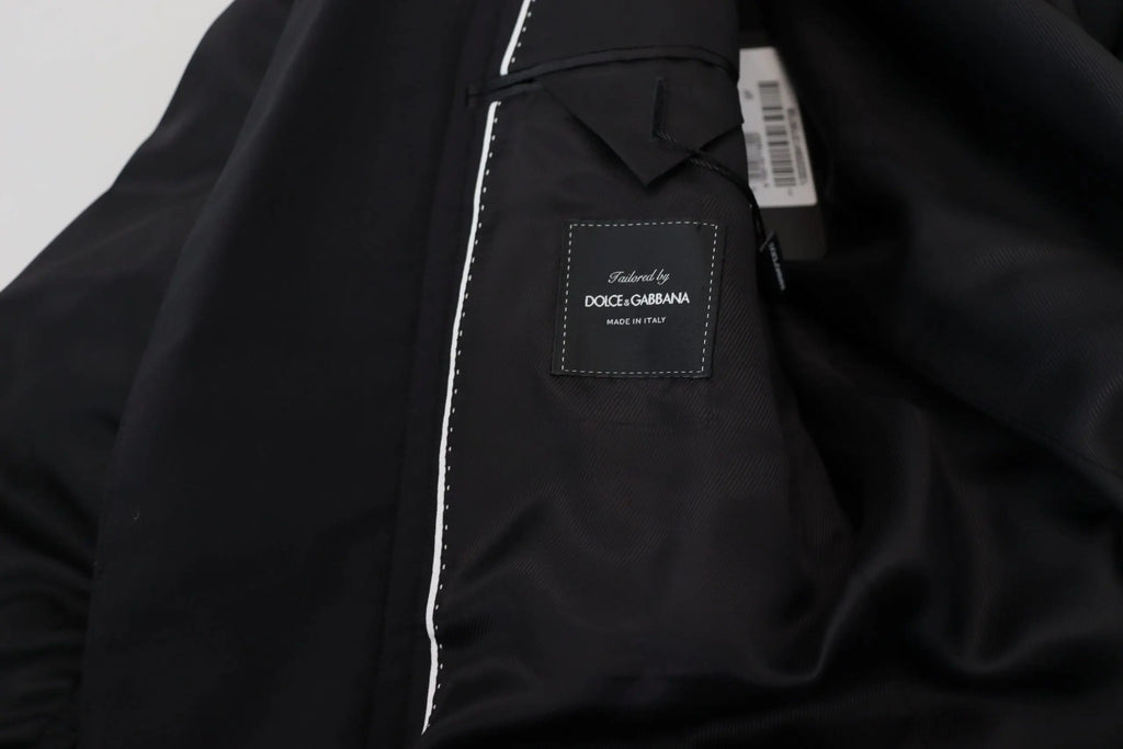 Veste noire dolce & gabbana en laine avec fermeture éclair intégrale et couture blanche le long des seams