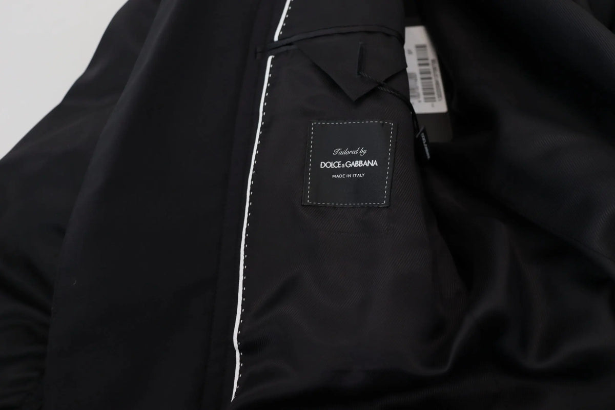 Veste noire dolce & gabbana en laine avec fermeture éclair intégrale et couture blanche le long des seams