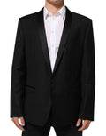 Veste de costume noire dolce gabbana en laine avec un bouton or et revers en satin noir