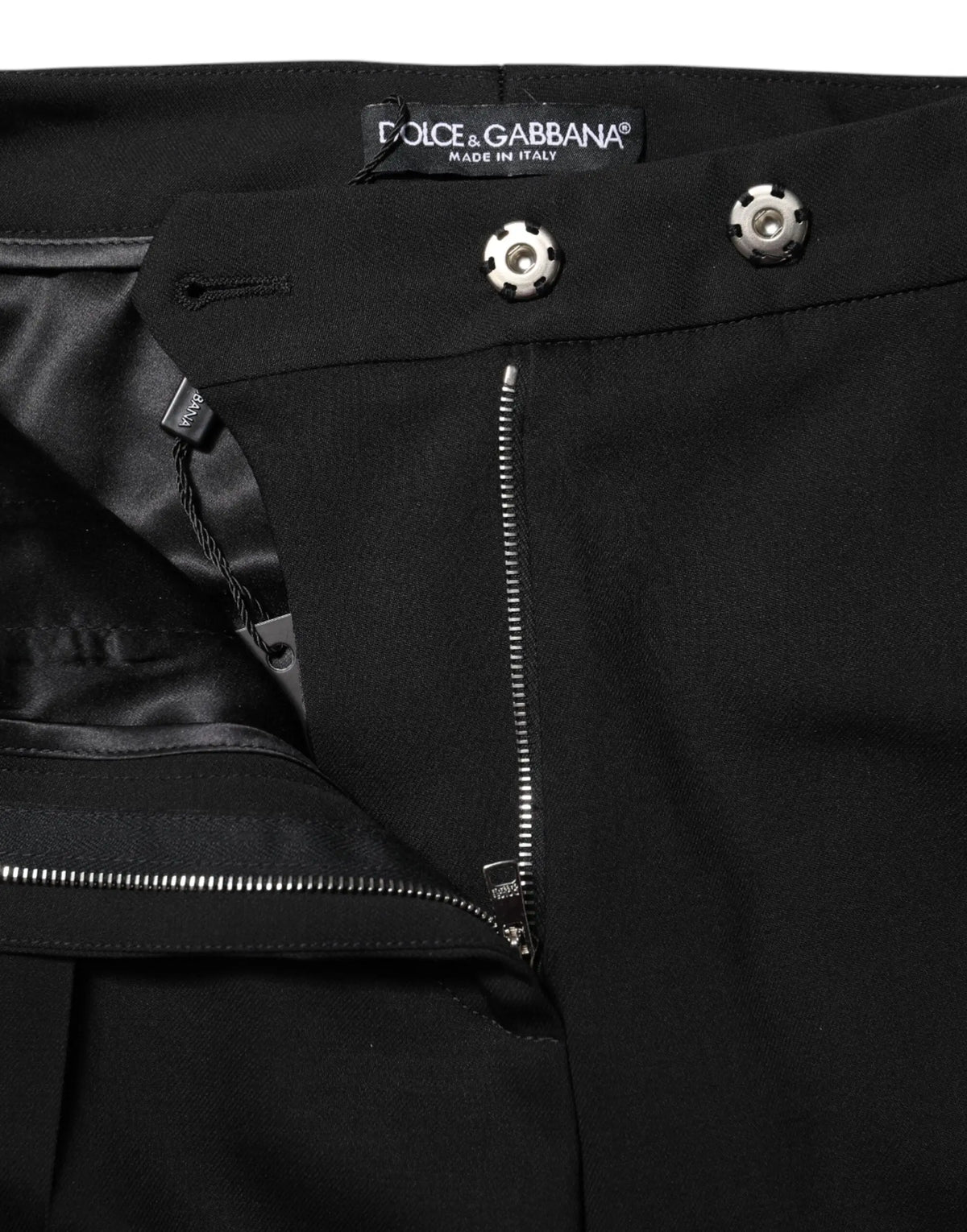 Pantalon évasé taille haute en laine noire dolce & gabbana avec boutons argentés et intérieur doublé en satin