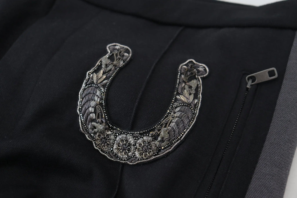 Détails brodés en forme de fer à cheval en argent sur tissu noir des pantalons jogging en laine dolce & gabbana