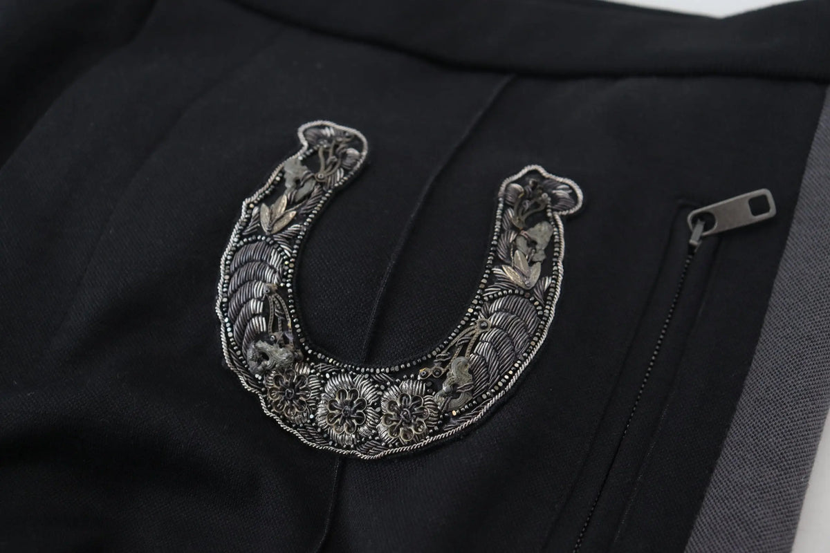 Détails brodés en forme de fer à cheval en argent sur tissu noir des pantalons jogging en laine dolce & gabbana